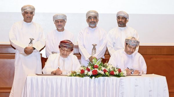 Minister of Heritage and Tourism signing Oman Maritime Museum deal 